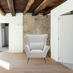 A timeless Verellen classic -- the Paola chair is the perfect hug. The walnut base and hand-hammered iron legs, its sophistication and uniqueness makes it unforgettable.  This chair comes standard with:   foam/down wrap tight seat construction tight back exposed wood detail base hand hammered solid metal legs knife edge kidney pillow double needle stitch detail