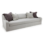 The beautiful, sloping arms of Verellen's Sloane Sofa Family will suit any environment! Standard options include:  • Spring Down Seat Construction • Loose Bench Seat • Boxed Back Pillows • Knife Edge Toss • Double Needle • Slipcovered and Upholstered Available • Recessed Legs • Available as a Sectional – Please see Sectional Guide