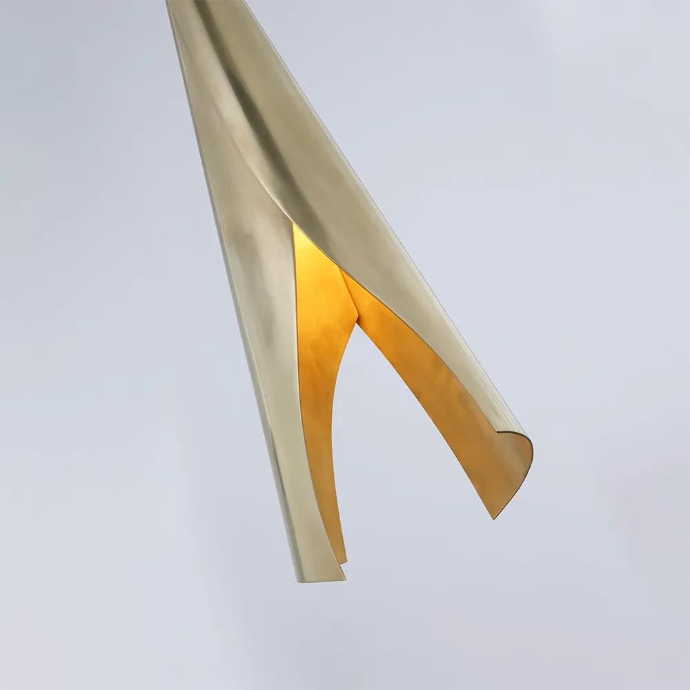 Featuring Piel Medium Wrapped Pendant by Visual Comfort at Amethyst Home. Kelly Wearstler's Piel series evokes the sculptural beauty of effortlessly folded metal inspired by the brutalist art movement. Hand-cut solid brass sheets explore proportion and shape through soft, contemporary curves. Illuminated from within by a hidden light source, the flush moun. Amethyst Home provides interior design, new home construction design consulting, vintage area rugs, and lighting in the Washington metro area.