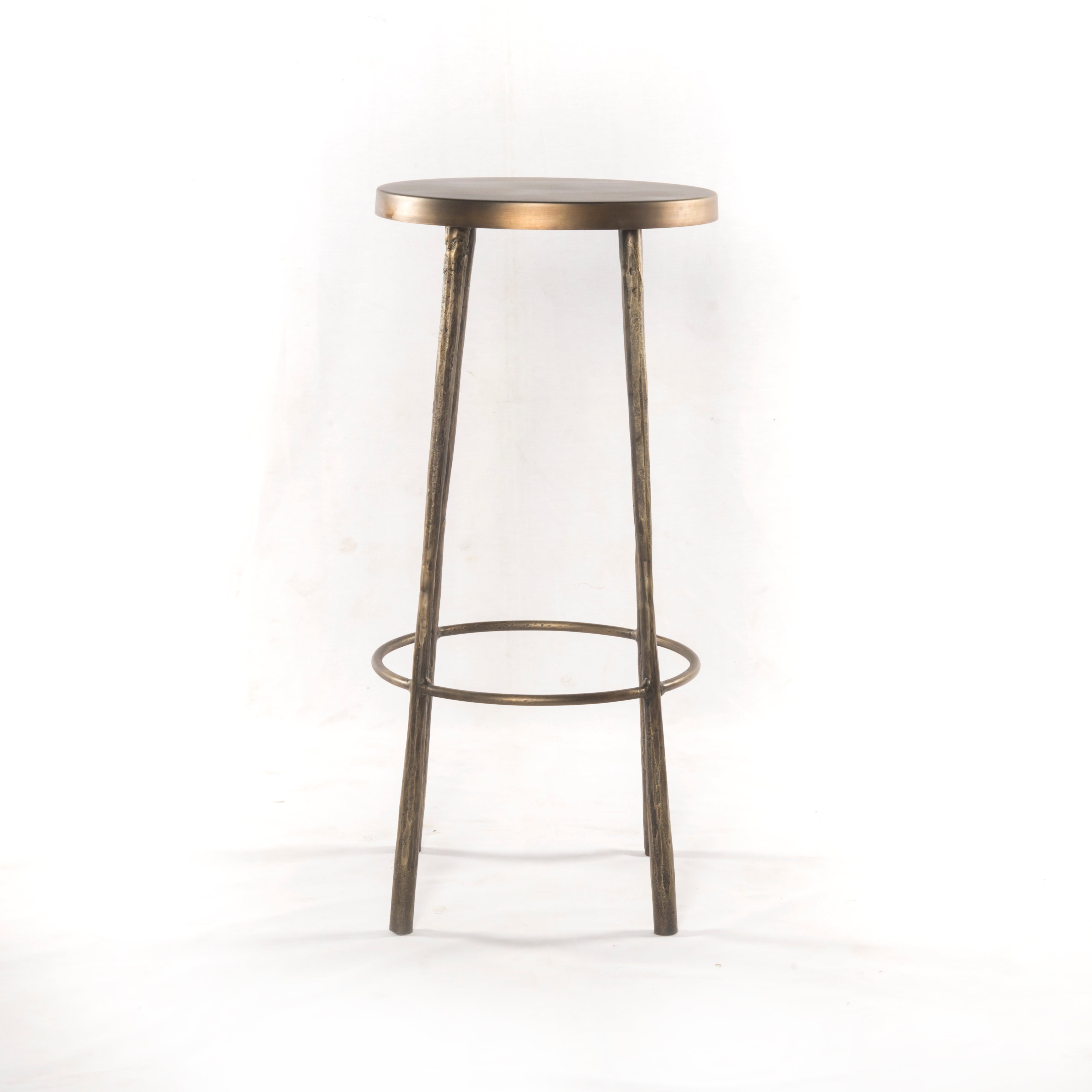 Featuring Westwood Bar + Counter Stool - Antique Brass by Four Hands at Amethyst Home. The Westwood Antique Brass Bar + Counter Stool have stunning hammered iron legs for a rich, industrial look. 
Counter Stool Overall Dimensions: 16"W x 16"L x 26.25"HSeat Depth: 14"Seat Height: 26.25"Bar Stool Overall Dimensions: 16"W x 16"L x 30"HSeat Depth: 14"Seat Height: . Amethyst Home provides interior design, new home construction design consulting, vintage area rugs, and lighting in the Boston metro area.