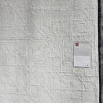 The Atlas Bone / Silver Area Rug by Loloi, or ATL-03, showcases striking contemporary patterns with a sophisticated color palette. Bold yet approachable, Atlas' muted linear designs create a sense of refined movement. Hand Knotted. Wool | Nylon