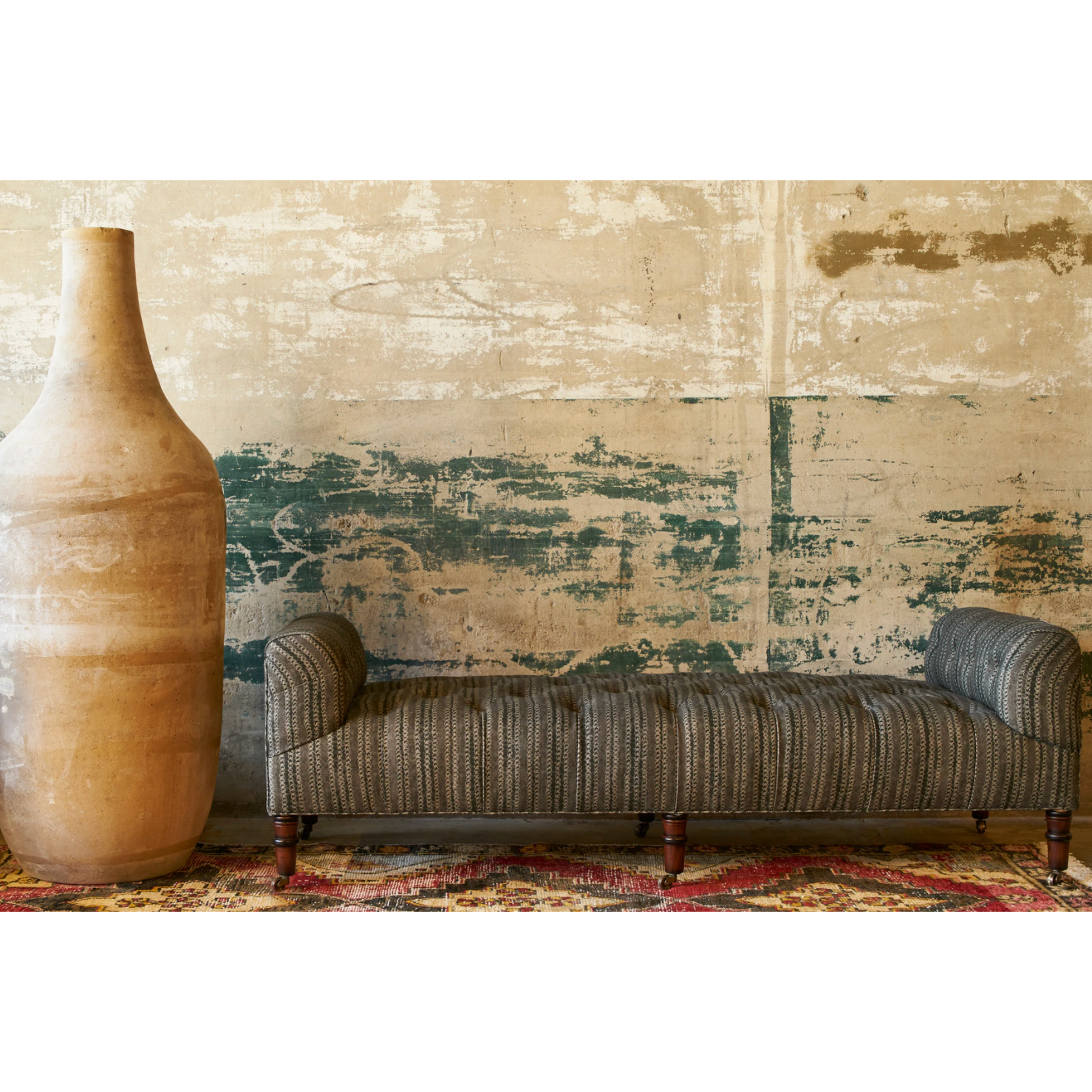 Featuring JD Field Bench No Back - Upholstered by Cisco Brothers at Amethyst Home. This JD Field Bench Upholstered is a glorious, tufted field bench on casters with leaps of old world meets modern style! A design collaboration between Cisco Home x John Derian.
Overall: 72"W x 22"H x 27"DSitting Space: 58"W x 27"DSeat Height: 16"hArm Height: 22"hWeight: 85lb. Amethyst Home provides interior design, new home construction design consulting, vintage area rugs, and lighting in the Miami metro area.