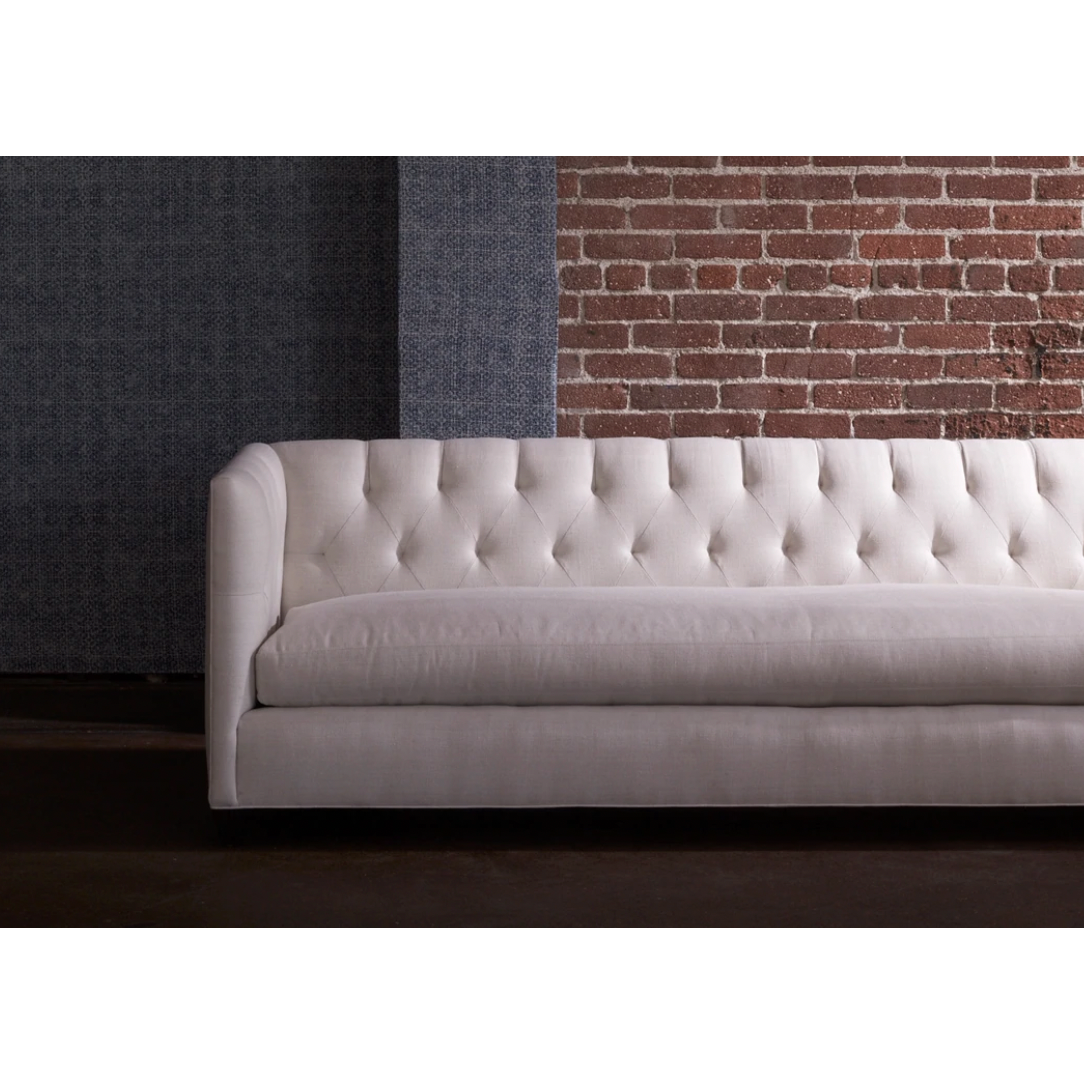 Featuring Kenso Upholstered 84" Sofa by Cisco Brothers at Amethyst Home. A sleek update on a living room staple, the Kenso Upholstered 84" Sofa by Cisco Home perfectly blends modern and traditional styles. It strikes a boxy silhouette, softened by the tufted back and inviting bench seating. It’s tapered button leg style rounds out the design.
Overall: . Amethyst Home provides interior design, new home construction design consulting, vintage area rugs, and lighting in the Newport Beach metro area.