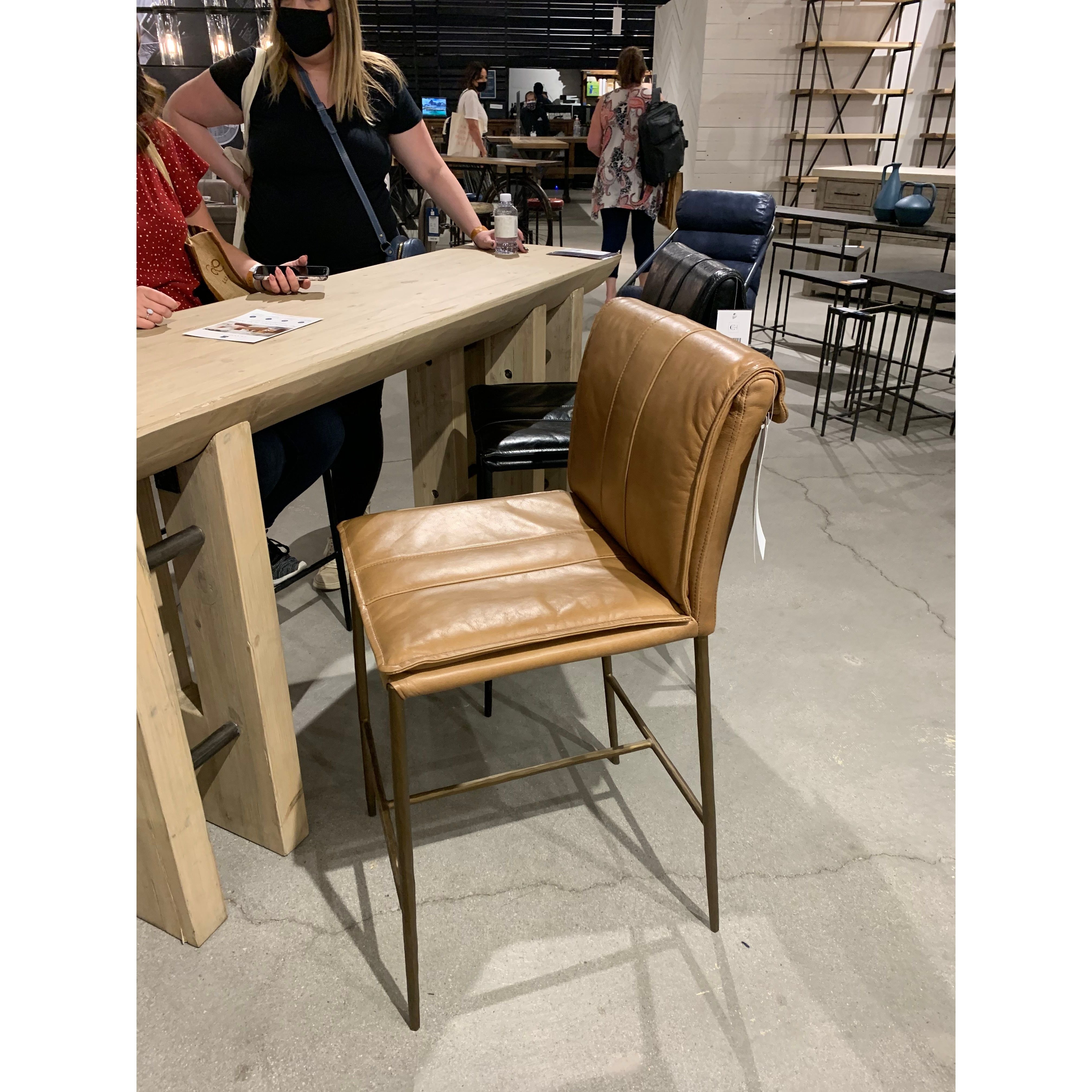 We the love the sleek look the tan top grain leather brings to this Mayer Bar + Counter Stool - Tan -- the perfect stool for any kitchen or bar area.