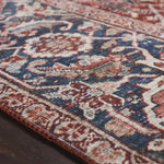 The Layla rug collection from Loloi is traditional and timeless, with a beautiful lived-in design that captures the spirit of an old-world rug. This traditional power-loomed rug is crafted of 100% polyester with a classic and sophisticated color palette and subtle patina.  Power Loomed 100% Polyester LAY-08 Red/Navy Colors: Red, Navy, Blue, Ivory