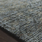 Hand-knotted in India of 100% wool, the Amara Blue/Gold Area Rug creates a casual yet refined vibe with high-end appeal. Showcase in your living room, bedroom, entryway, or other high traffic area.   Hand Knotted 100% Wool AMM-05 Blue/Gold