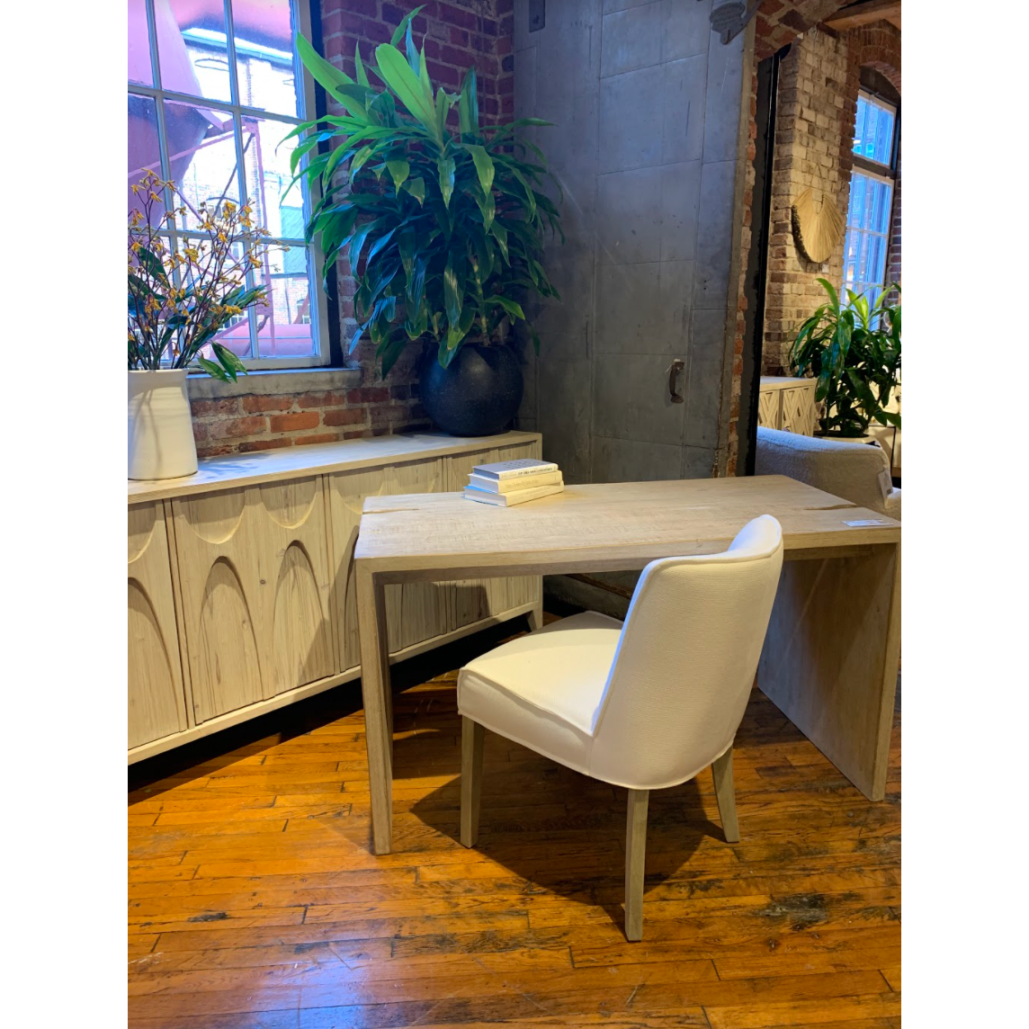 Featuring Merwin Desk by Dovetail at Amethyst Home. The simple construction of our Merwin Desk highlights the inherent beauty of the wood. Visible grain and knots give each piece its warm, individual character, and the open design leaves space for inspired styling. The whitewash finish brings a rustic, farmhouse feel to any office, living room, or other sp.  Amethyst Home provides interior design, new home construction design consulting, vintage area rugs, and lighting in the Charlotte metro area.