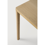 Featuring Oak Air Dining Table by Ethnicraft at Amethyst Home. With a simple, clean and minimal design, this Oak Air Dining Table is a table to add your dining room or kitchen area of years to come. The sleek bevelled legs makes the tabletop seems to float effortlessly above. 
Material: Oak, 100% Solid WoodFinish: Varnished
Dimensions 55": 55.5"w x 31.5"d .  Amethyst Home provides interior design, new home construction design consulting, vintage area rugs, and lighting in the Charlotte metro area.