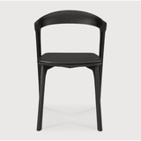 Featuring Oak Bok Dining Chair - Black - Black Leather by Ethnicraft at Amethyst Home. This Oak Bok Dining Chair features an airy shape with rock-solid construction,  making this piece a timeless and remarkable design to enjoy for years to come. Pair with a dining table or stand-alone against a wall, hallway, or end of the bed! Designed by Alain can Havre
Di.  Amethyst Home provides interior design, new home construction design consulting, vintage area rugs, and lighting in the Houston metro area.