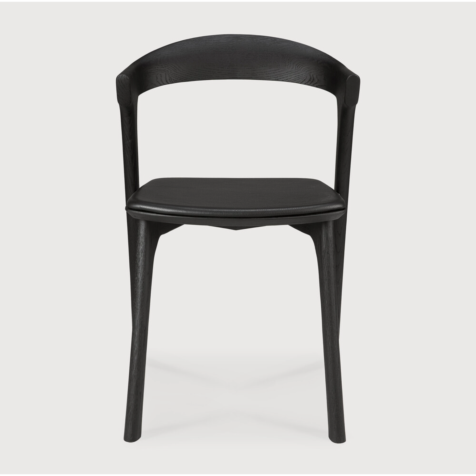 Featuring Oak Bok Dining Chair - Black - Black Leather by Ethnicraft at Amethyst Home. This Oak Bok Dining Chair features an airy shape with rock-solid construction,  making this piece a timeless and remarkable design to enjoy for years to come. Pair with a dining table or stand-alone against a wall, hallway, or end of the bed! Designed by Alain can Havre
Di.  Amethyst Home provides interior design, new home construction design consulting, vintage area rugs, and lighting in the Houston metro area.