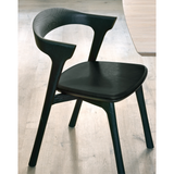 Featuring Oak Bok Dining Chair - Black - Black Leather by Ethnicraft at Amethyst Home. This Oak Bok Dining Chair features an airy shape with rock-solid construction,  making this piece a timeless and remarkable design to enjoy for years to come. Pair with a dining table or stand-alone against a wall, hallway, or end of the bed! Designed by Alain can Havre
.  Amethyst Home provides interior design, new home construction design consulting, vintage area rugs, and lighting in the Nashville metro area.