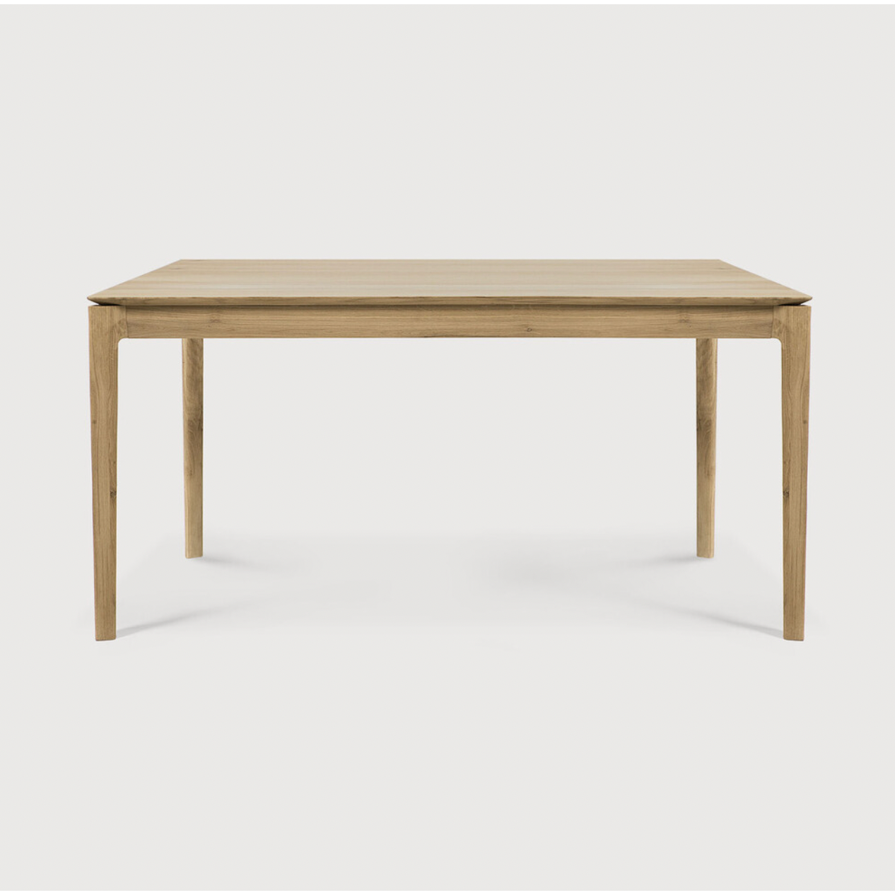 Featuring Oak Bok Dining Table by Ethnicraft at Amethyst Home. The airy shape yet rock solid construction make this Oak Bok Dining Table a timeless and remarkable design to enjoy for years to come. Available in many sizes, this can fit any dining room or kitchen area. 
Material: Oak, 100% Solid WoodFinish: Oiled
Dimensions 55": 55.5"w x 31.5"d x 30"hW.  Amethyst Home provides interior design, new home construction design consulting, vintage area rugs, and lighting in the Salt Lake City metro area.