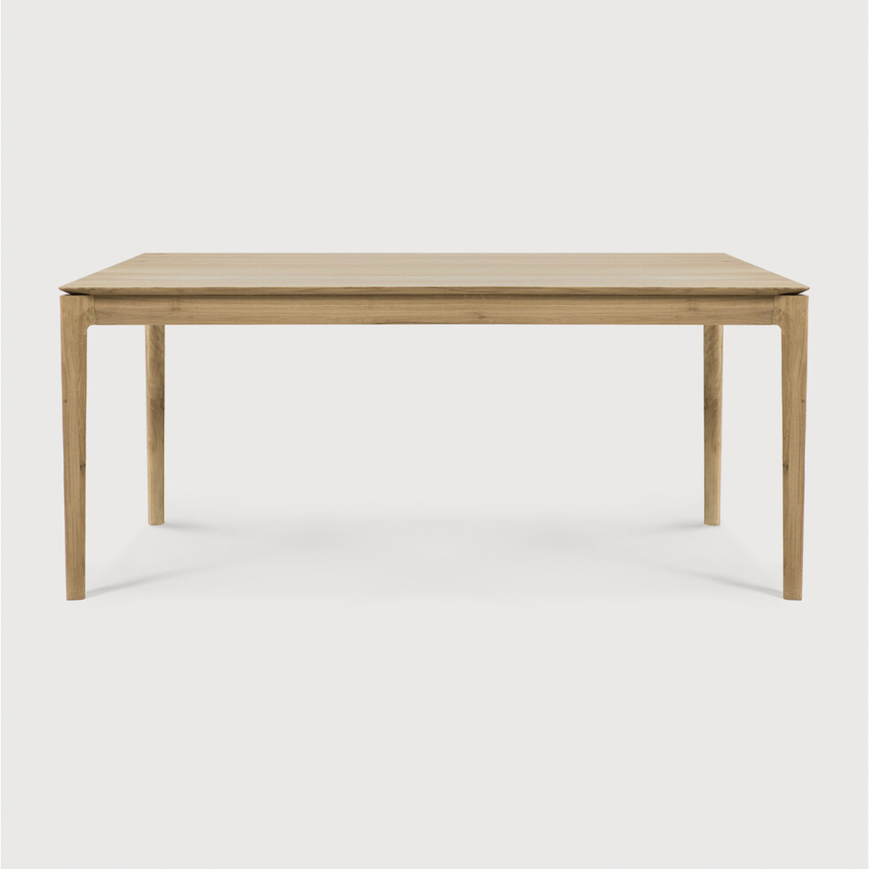 Featuring Oak Bok Dining Table by Ethnicraft at Amethyst Home. The airy shape yet rock solid construction make this Oak Bok Dining Table a timeless and remarkable design to enjoy for years to come. Available in many sizes, this can fit any dining room or kitchen area. 
Material: Oak, 100% Solid WoodFinish: Oiled
Dimensions 55": 55.5"w x 31.5"d x 30"hWeigh.  Amethyst Home provides interior design, new home construction design consulting, vintage area rugs, and lighting in the Alpharetta metro area.
