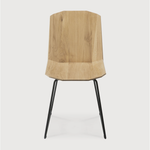 Featuring Oak Facette Dining Chair by Ethnicraft at Amethyst Home. This Oak Facette Dining Chair is both timeless, yet reflecting. We are so intrigued by this chair's ingenious wooden structure that is divided into facets, which makes the seating more comfortable and unique. This beautiful chair will add a sculptural element to your dining table or kitchen!
.  Amethyst Home provides interior design, new home construction design consulting, vintage area rugs, and lighting in the Houston metro area.