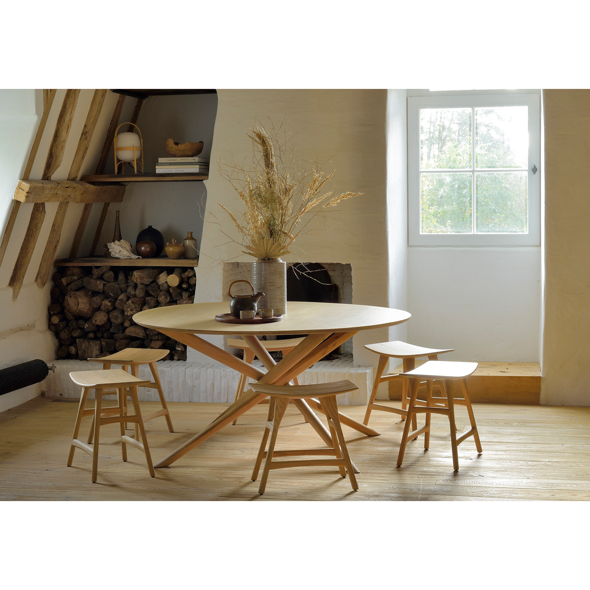 Featuring Oak Mikado Dining Table - Round by Ethnicraft at Amethyst Home. We love the sculptural character of this Oak Mikado Dining Table - Round. The legs interlock like a well-thought-out puzzle, making it easier to interact with your guests and allows you to converse with your family and friends for years to come!
Designed by Alain van Havre
Material: .  Amethyst Home provides interior design, new home construction design consulting, vintage area rugs, and lighting in the Calabasas metro area.