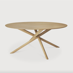 Featuring Oak Mikado Dining Table - Round by Ethnicraft at Amethyst Home. We love the sculptural character of this Oak Mikado Dining Table - Round. The legs interlock like a well-thought-out puzzle, making it easier to interact with your guests and allows you to converse with your family and friends for years to come!
Designed by Alain van Havre
Material: O.  Amethyst Home provides interior design, new home construction design consulting, vintage area rugs, and lighting in the Portland metro area.