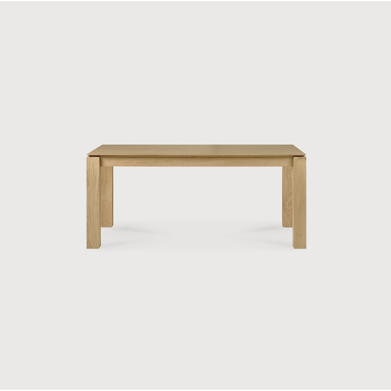 Featuring Oak Slice Dining Table by Ethnicraft at Amethyst Home. A seemingly simple and straightforward piece, the Oak Slice Dining Table features subtle corner details that add playful sophistication to the functional piece. A piece to gather your family and friends around for years to come. 
Material: Oak, 100% Solid WoodFinish: Oil
Dimensions 63": 63"w x 3.  Amethyst Home provides interior design, new home construction design consulting, vintage area rugs, and lighting in the Dallas metro area.