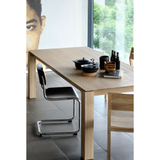 Featuring Oak Slice Dining Table by Ethnicraft at Amethyst Home. A seemingly simple and straightforward piece, the Oak Slice Dining Table features subtle corner details that add playful sophistication to the functional piece. A piece to gather your family and friends around for years to come. 
Material: Oak, 100% Solid WoodFinish: Oil
Dimensions 63": 63"w x 35.  Amethyst Home provides interior design, new home construction design consulting, vintage area rugs, and lighting in the Tampa metro area.