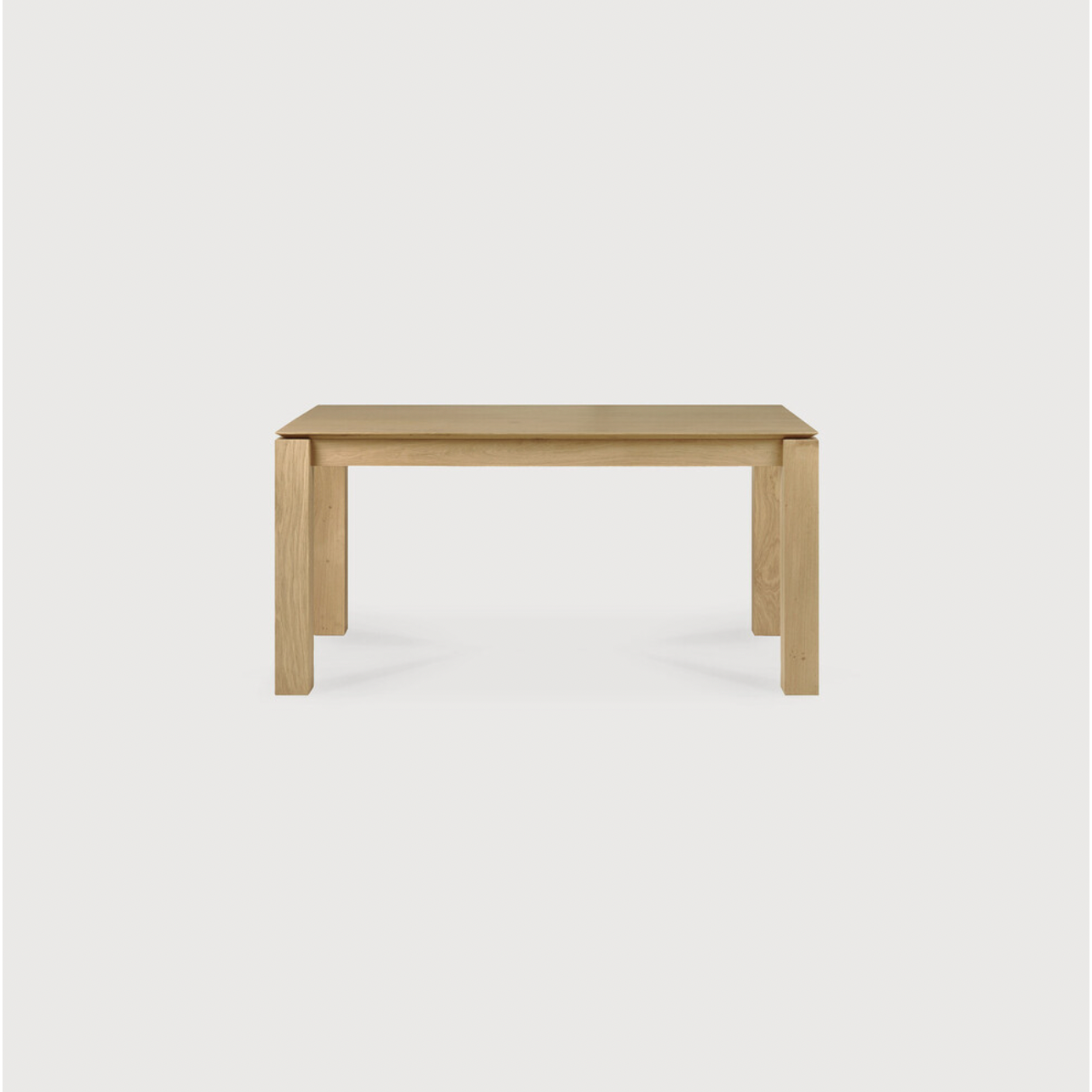 Featuring Oak Slice Dining Table by Ethnicraft at Amethyst Home. A seemingly simple and straightforward piece, the Oak Slice Dining Table features subtle corner details that add playful sophistication to the functional piece. A piece to gather your family and friends around for years to come. 
Material: Oak, 100% Solid WoodFinish: Oil
Dimensions 63": 63".  Amethyst Home provides interior design, new home construction design consulting, vintage area rugs, and lighting in the Los Angeles metro area.