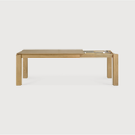 Featuring Oak Slice Extendable Dining Table by Ethnicraft at Amethyst Home. This Oak Slice Extendable Dining Table bevelled edges give it a unique character, but there's also a little extra added. This table can easily be extended without interruption of the wood grain pattern -- perfect for gathering your family or friends for hosting parties or the hol.  Amethyst Home provides interior design, new home construction design consulting, vintage area rugs, and lighting in the Kansas City metro area.