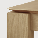 Featuring Oak Slice Extendable Dining Table by Ethnicraft at Amethyst Home. This Oak Slice Extendable Dining Table bevelled edges give it a unique character, but there's also a little extra added. This table can easily be extended without interruption of the wood grain pattern -- perfect for gathering your family or friends for hosting parties or the hol.  Amethyst Home provides interior design, new home construction design consulting, vintage area rugs, and lighting in the Kansas City metro area.