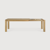 Featuring Oak Slice Extendable Dining Table by Ethnicraft at Amethyst Home. This Oak Slice Extendable Dining Table bevelled edges give it a unique character, but there's also a little extra added. This table can easily be extended without interruption of the wood grain pattern -- perfect for gathering your family or friends for hosting parties or the holi.  Amethyst Home provides interior design, new home construction design consulting, vintage area rugs, and lighting in the Scottsdale metro area.