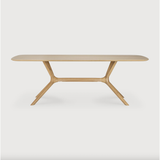 Featuring Oak X Dining Table by Ethnicraft at Amethyst Home. This Oak X Dining Table features sturdy, yet intricate, construction and is a true work of art and a credit to the most advanced woodworking techniques. With a seamless structural interplay between the unique shape of the legs and the soft lines of the tabletop, guests will enjoy the most comfor.  Amethyst Home provides interior design, new home construction design consulting, vintage area rugs, and lighting in the Washington metro area.