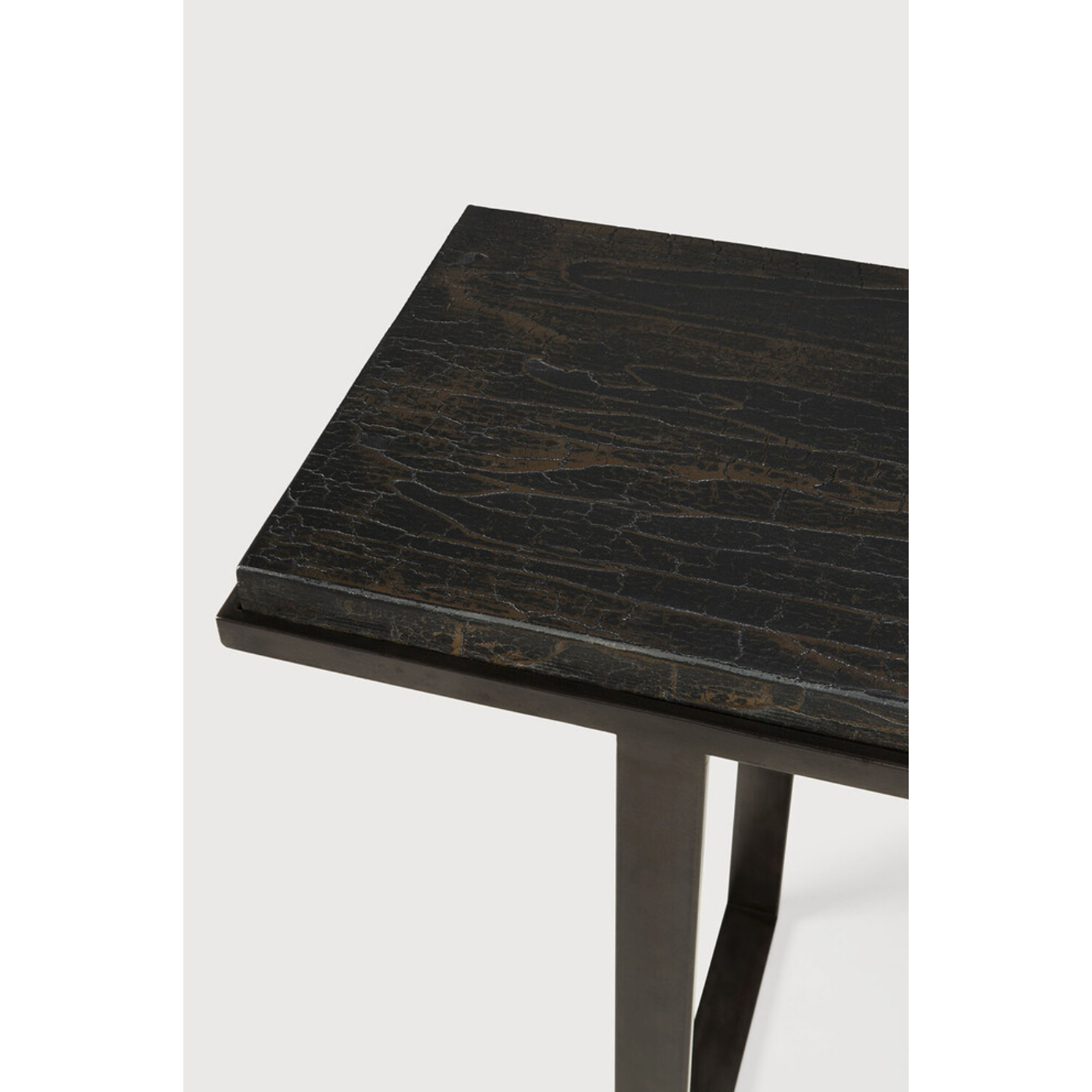 Featuring Stability Console Table - Umber by Ethnicraft at Amethyst Home. The deep surface of the Stability console is shaped by hand by skilled artisans. Natural mineral powders and color pigments blend to form the console's unique finish. We love how this piece's simple lines showcase the clean beauty of well-crafted metal work. We imagine this unique piec.  Amethyst Home provides interior design, new home construction design consulting, vintage area rugs, and lighting in the Seattle metro area.