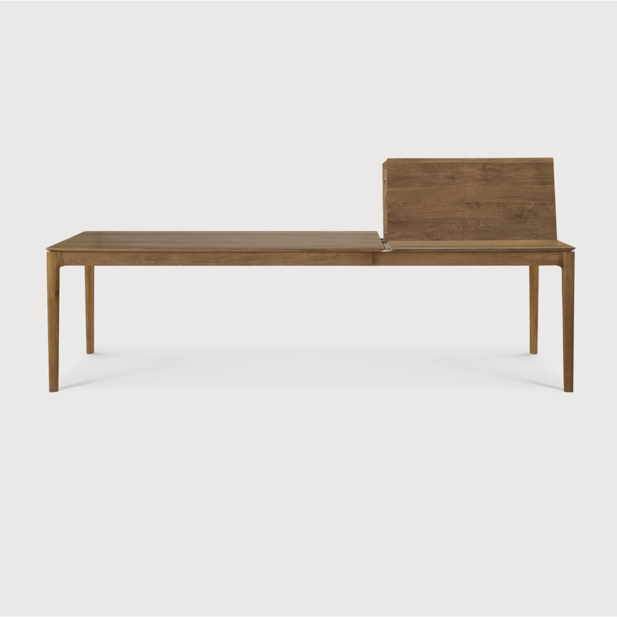 Featuring Teak Bok Extendable Dining Table by Ethnicraft at Amethyst Home. This Teak Bok Extendable Dining Table is perfect for families who want extra space when their kids, extended family, or guests come to celebrate! Its airy shape yet rock solid construction make this piece a timeless and remarkable design to enjoy for years to come.
Material: TeakFin.  Amethyst Home provides interior design, new home construction design consulting, vintage area rugs, and lighting in the Calabasas metro area.