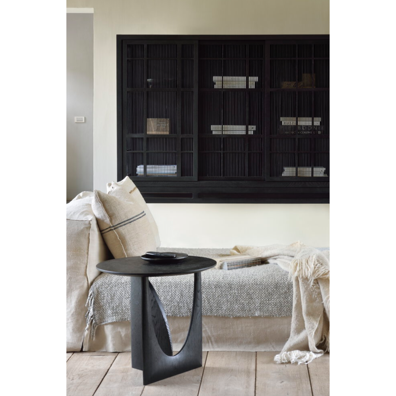 Featuring Oak Geometric Side Table - Black by Ethnicraft at Amethyst Home. From any angle, the Oak Geometric Side Table does not only look different, it also becomes different. We love seeing this table as a sculptural accent to your living space or office.Designed by Alain van Havre
Dimensions: 20.5"w x 20.5"d x 20"h Weight: 11 lbs
Material: OakFinish: Varni.  Amethyst Home provides interior design, new home construction design consulting, vintage area rugs, and lighting in the Austin metro area.