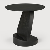 Featuring Teak Oblic Side Table - Black by Ethnicraft at Amethyst Home. We love the unique base of this Teak Oblic Side Table - Black. Place near your sofa, bed side table, or accent chair to completely elevate the space!
Dimensions: 20.5"w x 20.5"d x 19.5"h Weight: 21 lbs
Material: Teak, 100% Solid WoodFinish: Varnished
For regular dusting use a dry cloth.  Amethyst Home provides interior design, new home construction design consulting, vintage area rugs, and lighting in the Charlotte metro area.