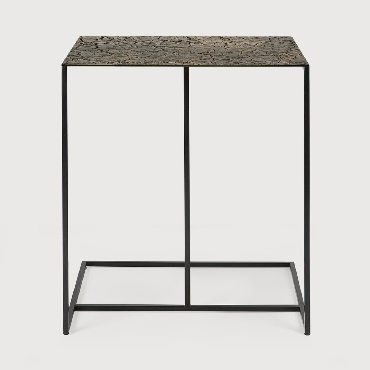 Featuring Triptic Side Table - Lava Whisky by Ethnicraft at Amethyst Home. The Triptic table is a chic and practical side table that could sit perfectly with your sofa, ideal for a laptop or beverages. We love how this little table will elevate your living space aesthetically and functionally! We can't get enough of this distinctive table top finish that i.  Amethyst Home provides interior design, new home construction design consulting, vintage area rugs, and lighting in the Charlotte metro area.