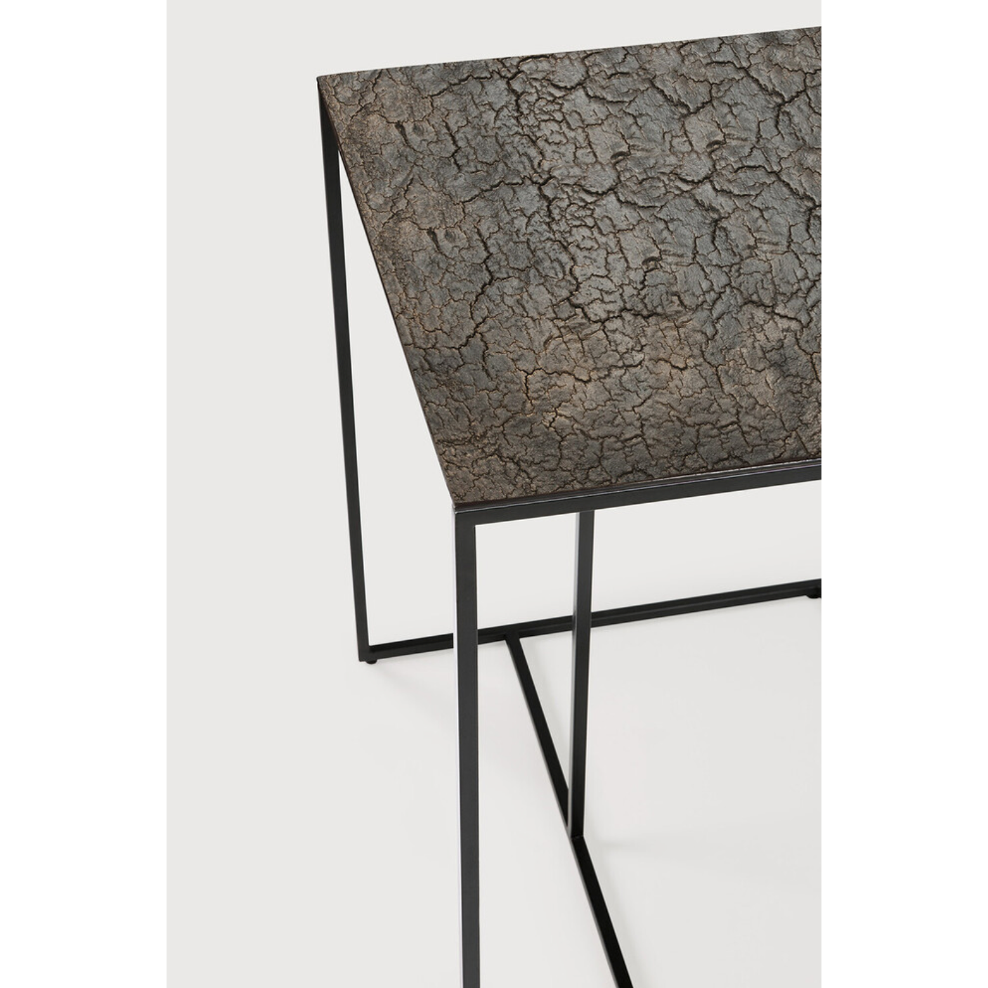 Featuring Triptic Side Table - Lava Whisky by Ethnicraft at Amethyst Home. The Triptic table is a chic and practical side table that could sit perfectly with your sofa, ideal for a laptop or beverages. We love how this little table will elevate your living space aesthetically and functionally! We can't get enough of this distinctive table top finish that.  Amethyst Home provides interior design, new home construction design consulting, vintage area rugs, and lighting in the Kansas City metro area.