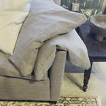 This cozy Donato Sofa from Cisco Brothers is our favorite! As shown slipcovered in Mariet White 100% linen fabric. Amethyst Home provides interior design, new home construction design consulting, vintage area rugs, and lighting in the Kansas City metro area.