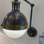 We love how the Hicks Library Light by Visual Comfort has two points of movement with a dimmer on the backplate. A classy, gorgeous lighting to add to your study, hallway, or other area needing extra light.  Designer: Thomas O'Brien