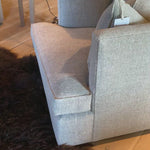 Verellen's Marilyn Sofa Family is bench-crafted in their North Carolina atelier, and features:  foam down seat construction loose boxed style seat cushion diamond tufted inside back with fabric covered ball buttons optional without tufting large and small knife edge toss pillows double needle stitch detail 4″ H conical leg