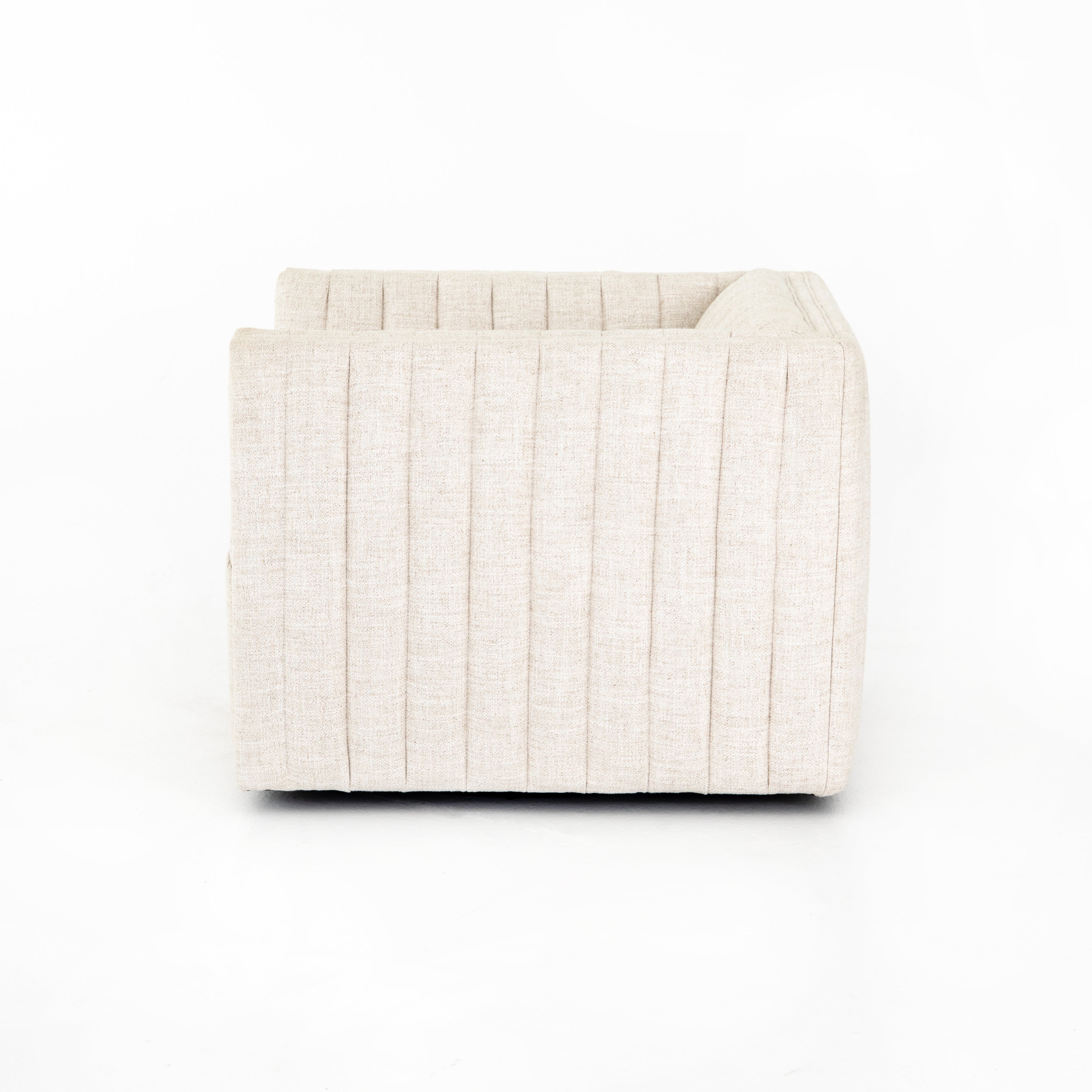 Featuring Augustine Swivel Chair - Cream by Four Hands at Amethyst Home. You will love the dramatic channeling of this Augustine Cream Swivel Chair. The swivel feature sets this apart from other chairs and is a great choice for any living room or media room. This chair is comfort wrapped in soft linen blend making this everyone's favorite chair.Overall .  Amethyst Home provides interior design, new home construction design consulting, vintage area rugs, and lighting in the Laguna Beach metro area.