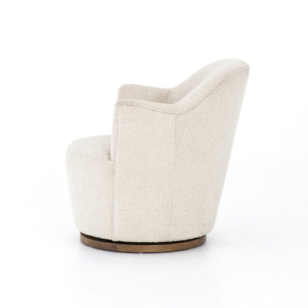 We love the drum-style seating of this Aurora Swivel - Knoll Natural. Upholstered in a soothing and textural off-white boucl�