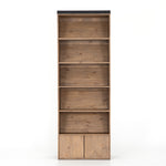 Featuring Bane Bookshelf by Four Hands at Amethyst Home. Five roomy shelves are ready to store favorite books and treasures, with smoked solid pine suited for any space. Removable ledges slant at an angle on each shelf, for even-better display of art and coffee table-size books, plus an optional slide ladder (for decorative use only) to complete the look.
.  Amethyst Home provides interior design, new home construction design consulting, vintage area rugs, and lighting in the Calabasas metro area.