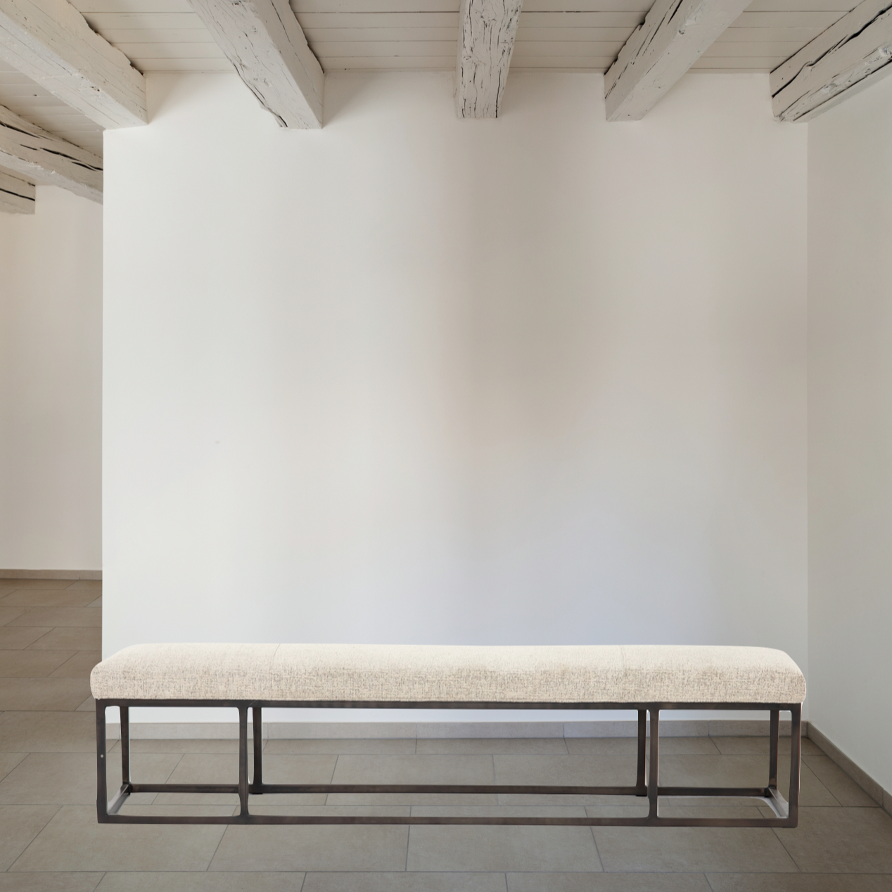 Featuring Beaumont Bench - Plushtone Linen by Four Hands at Amethyst Home. The Beaumont Plushtone Linen Bench has streamlined shaping and is textural to the touch. Gunmetal-finished iron framing stands slim and structured to support a well-tailored top of plush, linen-like upholstery. Open, adaptable styling allows for versatile placement options.
Overall.  Amethyst Home provides interior design, new home construction design consulting, vintage area rugs, and lighting in the Scottsdale metro area.