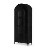 Featuring Belmont Black Iron Cabinet by Four Hands at Amethyst Home. Display barware, books, or other treasures in an arch-topped cabinet. Solid iron sheeting is finished in soft, matte black with contrasting brass hardware.
Overall Dimensions: 39.50"W x 15.75"L x 92.50"HColors: Black, Clear Glass, Weathered BronzeMaterials: Iron, GlassWeight: 229.94 l.  Amethyst Home provides interior design, new home construction design consulting, vintage area rugs, and lighting in the Newport Beach metro area.