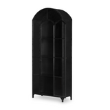Featuring Belmont Black Iron Cabinet by Four Hands at Amethyst Home. Display barware, books, or other treasures in an arch-topped cabinet. Solid iron sheeting is finished in soft, matte black with contrasting brass hardware.
Overall Dimensions: 39.50"W x 15.75"L x 92.50"HColors: Black, Clear Glass, Weathered BronzeMaterials: Iron, GlassWeight: 229.94 lbV.  Amethyst Home provides interior design, new home construction design consulting, vintage area rugs, and lighting in the Los Angeles metro area.