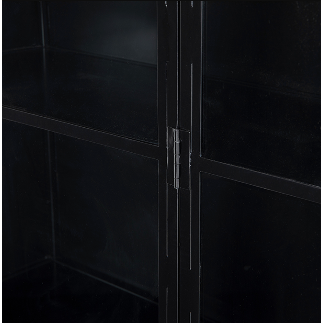 Featuring Belmont Black Iron Cabinet by Four Hands at Amethyst Home. Display barware, books, or other treasures in an arch-topped cabinet. Solid iron sheeting is finished in soft, matte black with contrasting brass hardware.
Overall Dimensions: 39.50"W x 15.75"L x 92.50"HColors: Black, Clear Glass, Weathered BronzeMaterials: Iron, GlassWeight: 229.94 lbVolume:.  Amethyst Home provides interior design, new home construction design consulting, vintage area rugs, and lighting in the Miami metro area.
