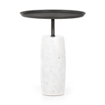 Featuring Cronos End Table - Polished White Marble by Four Hands at Amethyst Home. Simply sophisticated with this Cronos End Table - Polished White Marble. Finished in a polished white, a solid turned marble base supports a tray-style tabletop of grey-hammered iron, spurring beautifully eye-catching contrast for any living room or bedroom. 
Overall Dimensions.  Amethyst Home provides interior design, new home construction design consulting, vintage area rugs, and lighting in the Boston metro area.