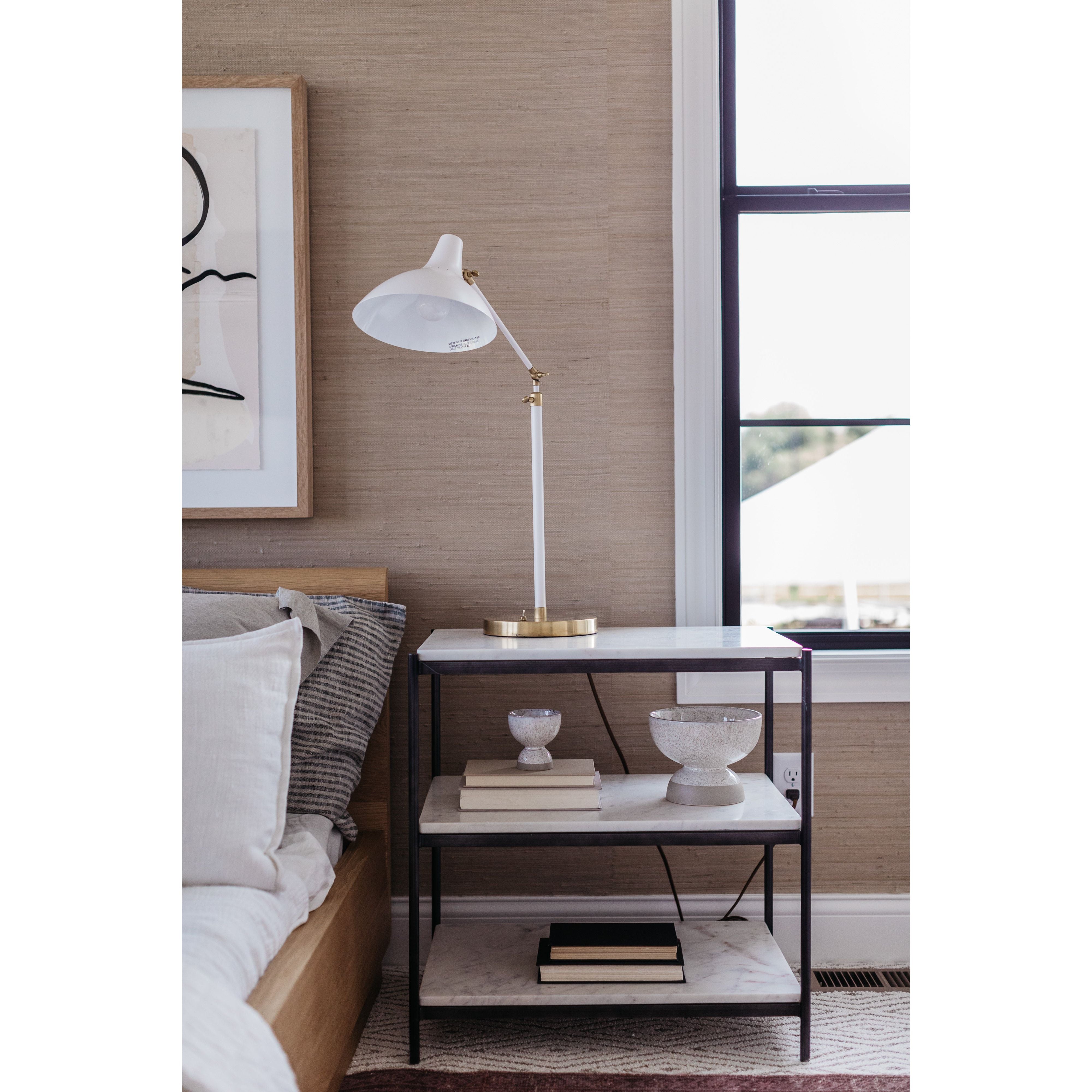 Featuring Tatum Nightstand - Hammered Gray by Four Hands at Amethyst Home. A luxe alternative to nightstands -- this Tatum marble nightstand is sophisticated, easy to style, and we love the proportions with a king sized bed.
Overall Dimensions: 25"W x 18"L x 26"H
Colors: Hammered Grey W/Clear Powder Coat, Polished White MarbleMaterials: Iron, Solid MarbleWeig.  Amethyst Home provides interior design, new home construction design consulting, vintage area rugs, and lighting in the Boston metro area.