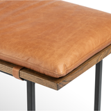 Featuring Gabine Accent Bench - Brandy by Four Hands at Amethyst Home. Airy, black-finished iron legs support a nettlewood dining bench of a chic, comfy layer of brandy top-grain leather on this Gabine Accent Bench - Brandy. A handsome piece to add to any bedroom, living room, or entryway. 
Overall Dimensions: 72"W x 18"L x 22"H
Colors: Midnight Iron, Toas.  Amethyst Home provides interior design, new home construction design consulting, vintage area rugs, and lighting in the Calabasas metro area.