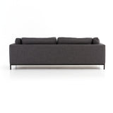 Featuring Grammercy Sofa - Charcoal by Four Hands at Amethyst Home. Streamlined yet comfortable!  We loved the subtle piping of the cushion details and stress-free color!  Flexible style, luxurious comfort and family-friendly upholstery. Clean, simple lines and black iron base keep everything casual and chic. Overall Dimensions: 92"W x 39.50"L x 30"HColor.  Amethyst Home provides interior design, new home construction design consulting, vintage area rugs, and lighting in the Washington metro area.