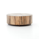 Featuring Hudson Coffee Table - Spalted Primavera by Four Hands at Amethyst Home. Stunning forces of nature are captured in the Hudson Spalted Primavera Coffee Table. We love how the spalted primavera wood is hand-shaped into a cylindrical silhouette. Reflective of woods' natural character, a slight color variance is possible. 
Overall Dimensions: 40"W x.  Amethyst Home provides interior design, new home construction design consulting, vintage area rugs, and lighting in the Kansas City metro area.