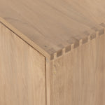 Featuring Isador Media Console - Dry Wash Poplar by Four Hands at Amethyst Home. This Isador Media Console - Dry Wash Poplar is clean, bright and dreamy. Solid dry-washed poplar forms a clean-lined media console with dovetail joinery plus iron and leather hardware, for a fresh look to any living room.
Ample shelving + rear cut outs for cord management bri.  Amethyst Home provides interior design, new home construction design consulting, vintage area rugs, and lighting in the Washington metro area.