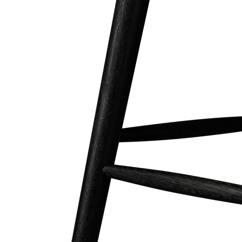 Featuring Lewis Windsor Bar + Counter Stool - Black Oak by Four Hands at Amethyst Home. A clean, modern take on the traditional Windsor. This tall and beautiful Windsor Bar Stool is wire-brushed to highlight the cathedral grain of black oak.
Bar Stool Overall Dimensions: 18.25"W x 20.25"L x 44.25"HSeat Depth: 16.50"Seat Height: 29"
Counter Stool Overall Di.  Amethyst Home provides interior design, new home construction design consulting, vintage area rugs, and lighting in the Nashville metro area.